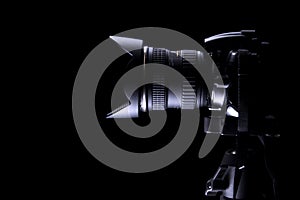 Professional DSLR camera on dark background