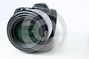 Professional dslr camera equipment with 70-300 mm tele zoom objective with wide camera lens in macro close-up view shows details