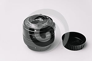 Professional DSLR Camera Lens and Cap on White
