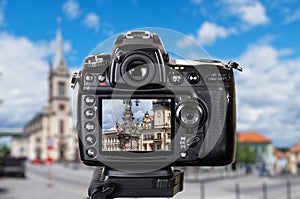 Professional DSLR camera taken pictures of the urban city