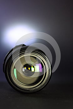 Professional DSLR lens on black background