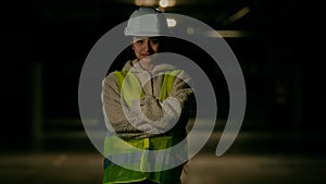 Professional engineer female architect inspector builder arabian woman in uniform protective helmet posing on parking