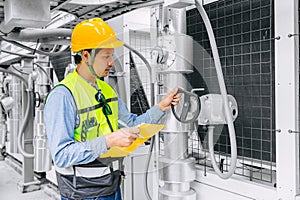 Professional engineer man working, Technician worker schedule check service pipe and valve system