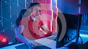 Professional eSports Gamer Playing in Computer Video Games. In Background Stylish Graphics. Online