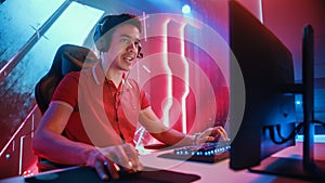 Professional eSports Gamer Playing in Computer Video Games. In Background Stylish Graphics. Online