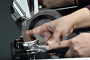 Professional espresso machine while preparing two espressos. Coffee machine.