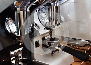 Professional espresso machine while preparing two espressos. Coffee machine. photo