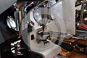 Professional espresso machine while preparing two espressos. Coffee machine.