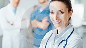 Professional female doctor posing and smiling