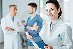 Professional female doctor posing and smiling