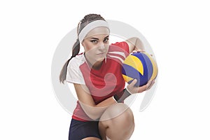 Professional Female Volleyball Player Sitting With Ball. Isolate