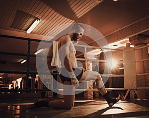 Professional fighter warm-up on training ring