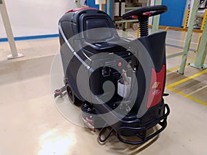 Professional floor cleaning, machine cleaning, factory floor maintenance photo