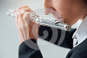 Professional flutist solo player photo