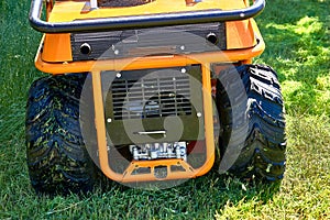 Professional grass cutting on lawns with a mini tractor lawn mower.