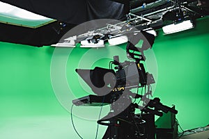 Professional green box tv studio. Prompter camera and studio lights