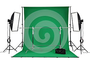 Professional green screen studio setup with lighting equipment