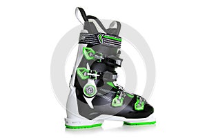 Professional Green ski boots isolated on white background