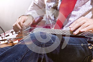 Professional Guitar Player with Electric Guitar Hands Closeup. S