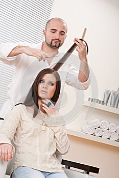 Professional hairdresser cut with scissors