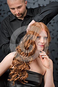 Professional hairdresser at luxury salon