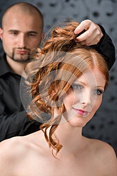 Professional hairdresser at luxury salon