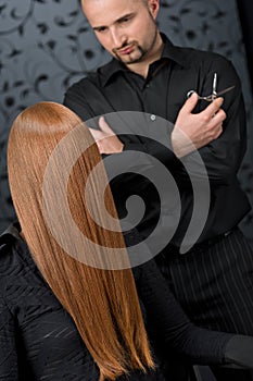 Professional hairdresser at luxury salon