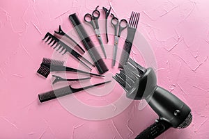 Professional hairdresser\'s tools on color background