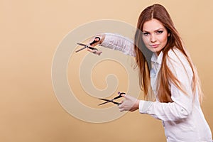 Professional hairdresser with scissors ready to cut