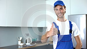 Professional handyworker showing thumbs up, ad of high-quality home repairs