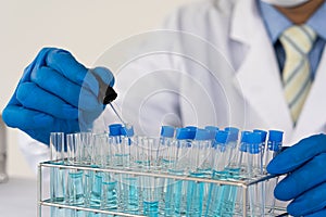 A professional healthcare researcher working in a medical science laboratory. Experimental Technology Around Pharmaceutical Chemis