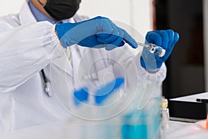 A professional healthcare researcher working in a medical science laboratory. Experimental Technology Around Pharmaceutical Chemis