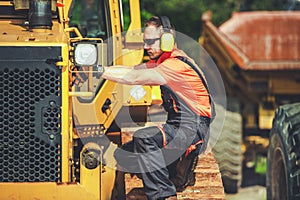 Professional Heavy Duty Machine Mechanic Performing Bulldozer Check