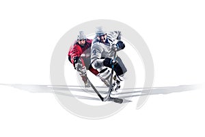 Professional hockey player skating on ice. Isolated in white