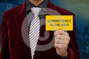 Professional holding card of Consistency is the