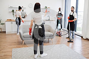 Professional housekeeper services company team working at customer house.