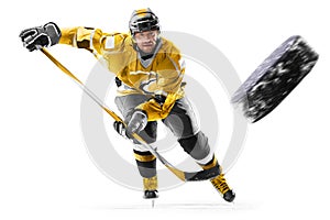 Professional ice hockey player in action on white backgound