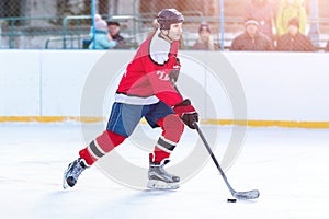 Professional ice hockey player in attack on the rink