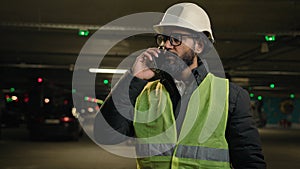 Professional industrial manufacture business industry worker Arabian bearded engineer Indian man in glasses builder in