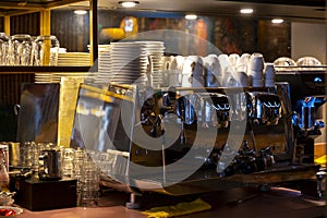 Professional Italian expresso coffee machine in small Italian bar in Rome