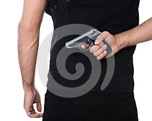 Professional killer with gun on white background