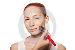 Professional Make-up artist doing glamour with red