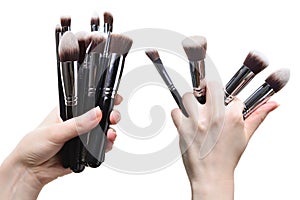 Professional make-up brush cosmetic in female hand beautician isolated on white background