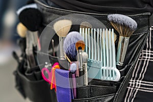 Professional Makeup Artist Applies Makeup To A Professional Model During A Commercial Photo Shoot