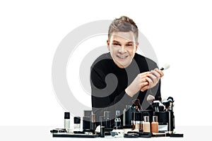 Professional makeup artist isolated on white