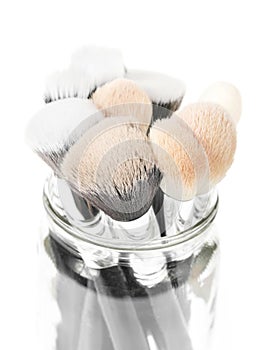 Professional makeup brush made of natural pile on a white background