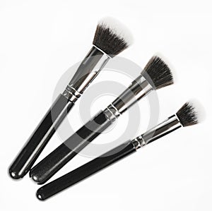 Professional makeup brush made of natural pile on a white background