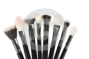 Professional makeup brush made of natural pile on a white background