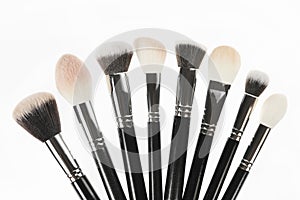 Professional makeup brush made of natural pile on a white background