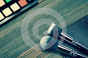 Professional Makeup Brush On The Rough Wood Background